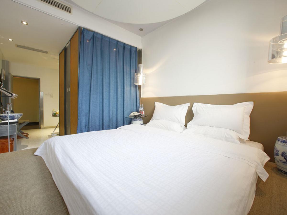 China Community Art Habitat Hotel Ціндао Номер фото